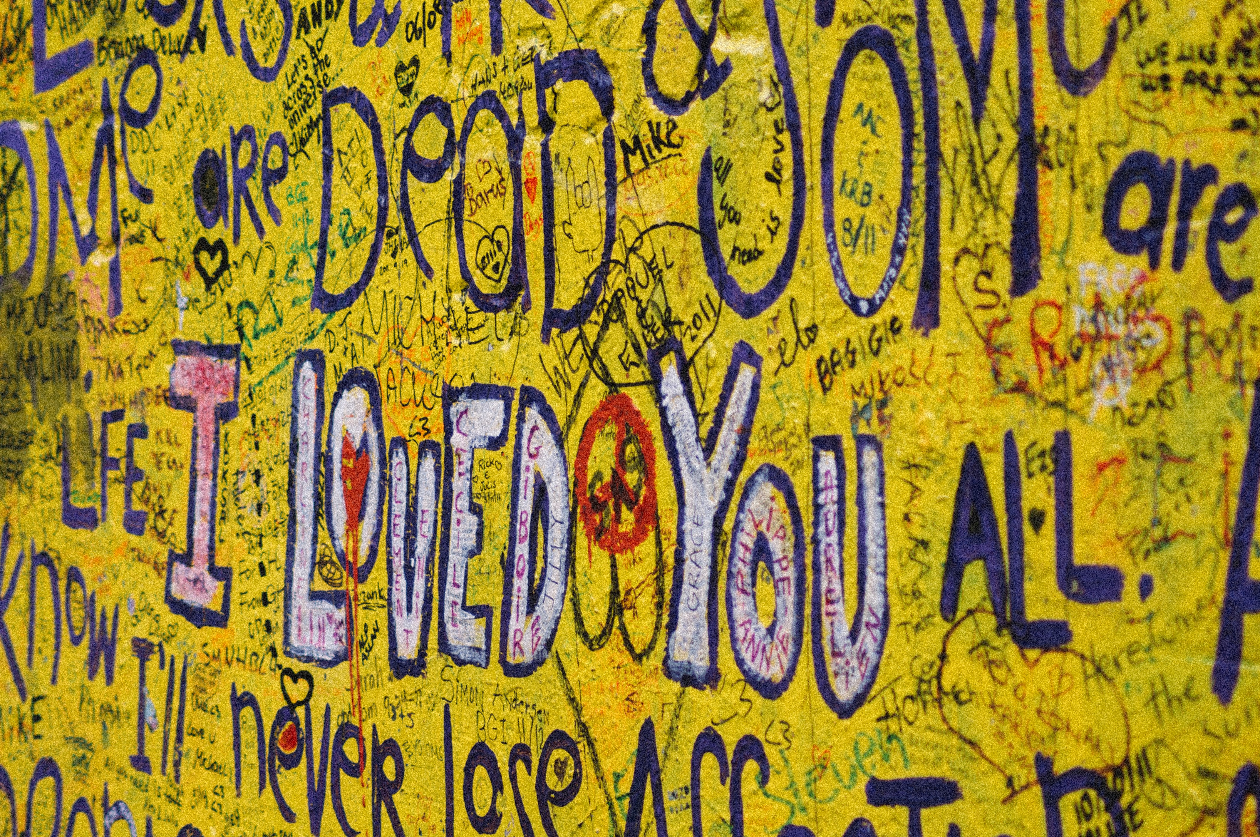 yellow and blue quote painted wall